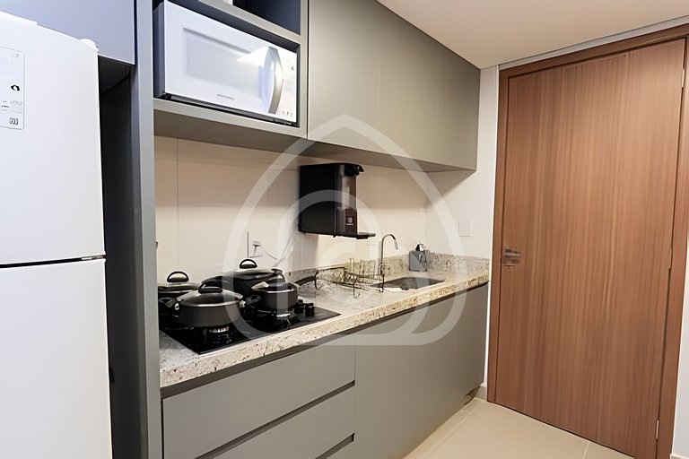 Studio completo com Wi-Fi, cozinha equipada e muito conforto