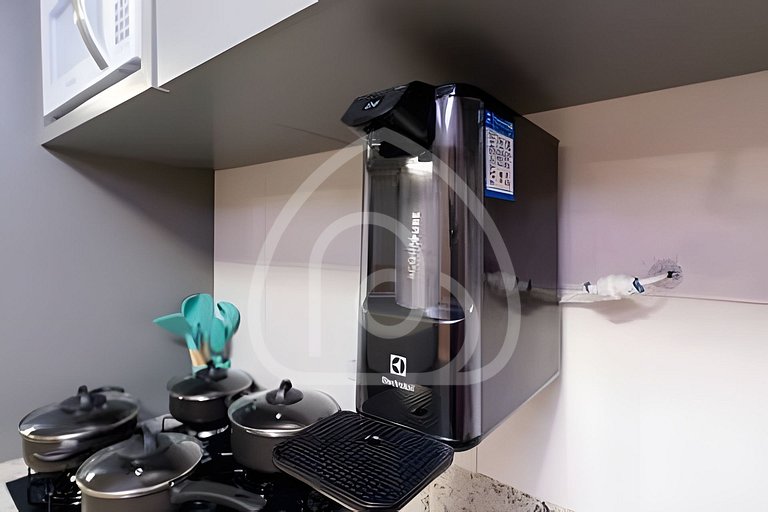 Studio completo com Wi-Fi, cozinha equipada e muito conforto