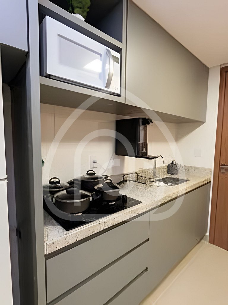 Studio completo com Wi-Fi, cozinha equipada e muito conforto