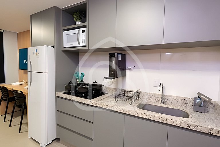 Studio completo com Wi-Fi, cozinha equipada e muito conforto