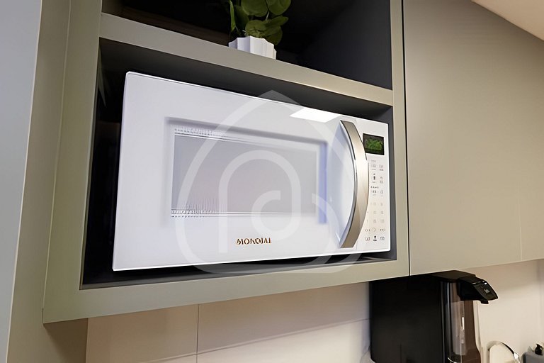 Studio completo com Wi-Fi, cozinha equipada e muito conforto
