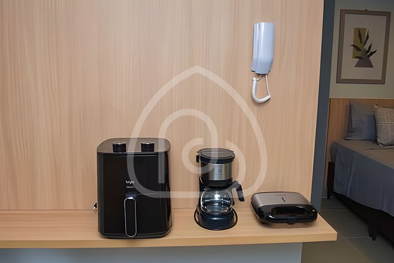 Studio completo com Wi-Fi, cozinha equipada e muito conforto
